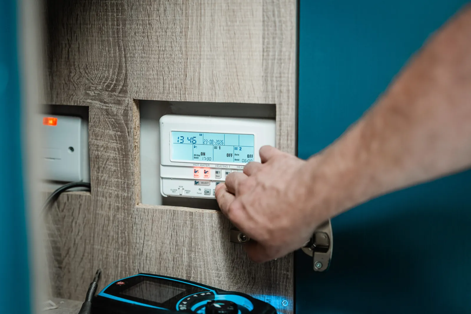 Heating and hot water time clock being reset after a service