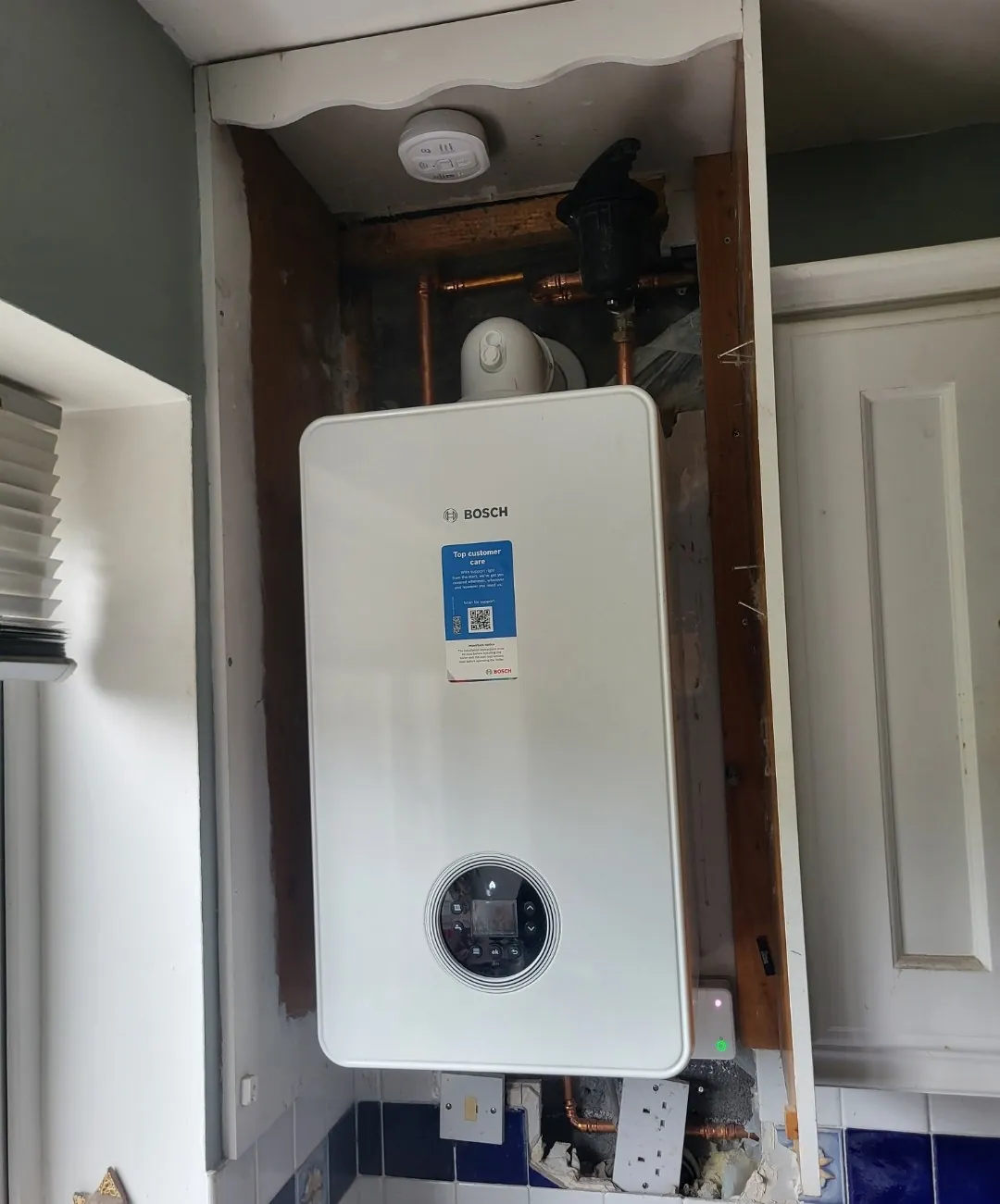 Bosch gas boiler installed and commissioned in a hall press